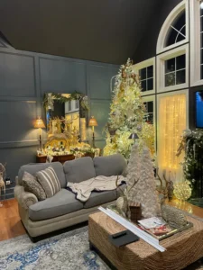 Luxury family room remodel with high ceilings, hardwood floors, custom molding, and large windows in Perkasie, PA