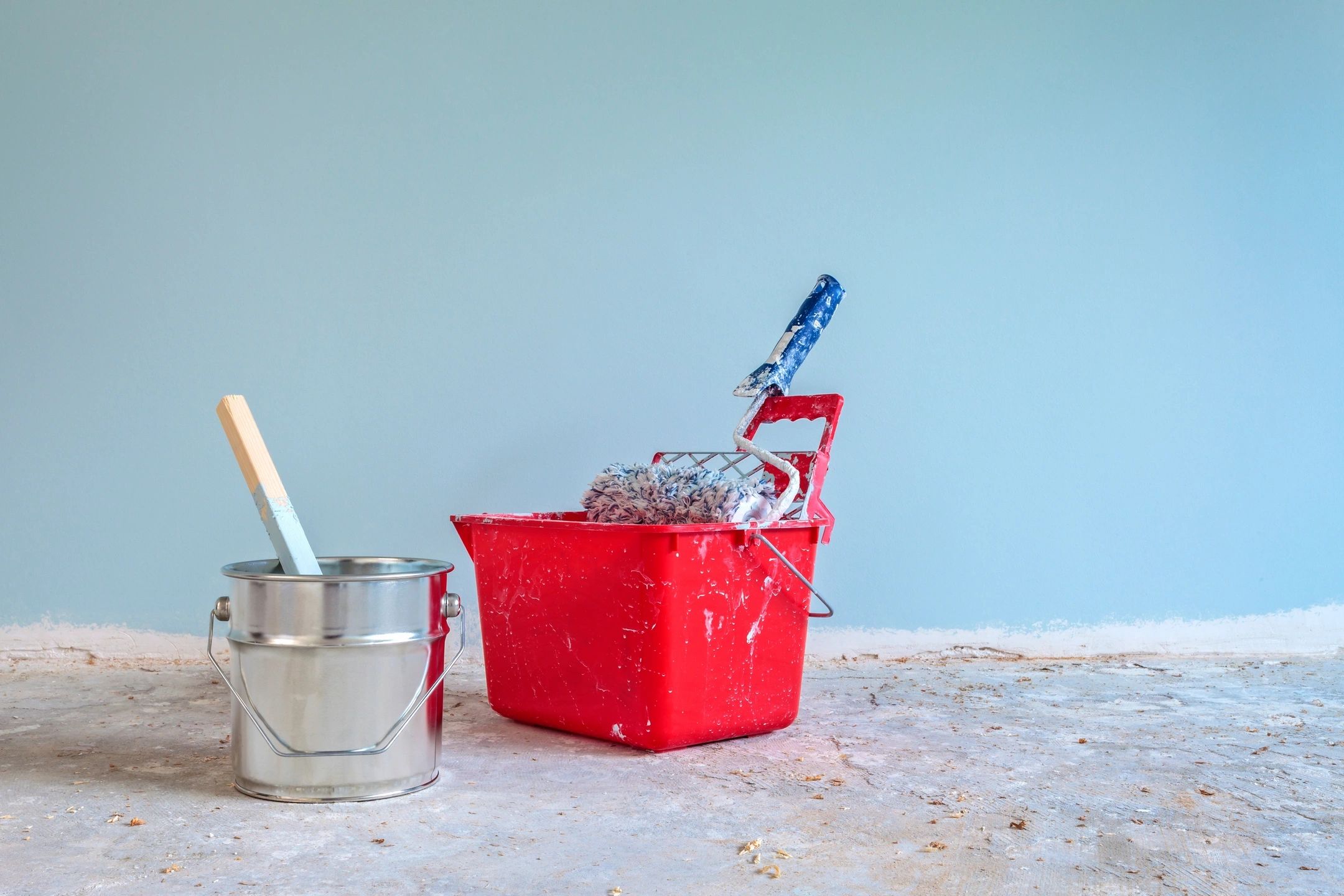 Interior wall renovation with open paint cans and supplies in Bucks County, PA