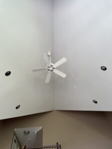 Interior reconstruction project with high ceilings, newly installed lighting, and luxury ceiling fan in Bucks County, Pennsylvania