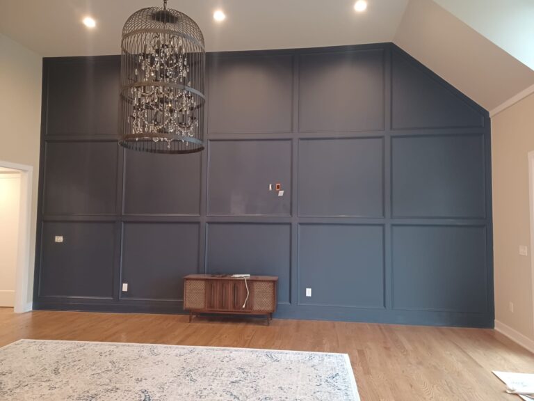 Luxury family room remodel with high ceilings, hardwood floors, custom molding, and large windows in Perkasie, PA